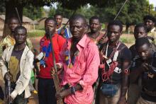 Militia fighters known as anti-balaka pose for a photograph in Mbakate village, Central African Republic