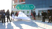 South and North Korean officials unveil the sign of Seoul to Pyeongyang during a groundbreaking ceremony for the reconnection of railways and roads at the Panmun Station in Kaesong, North Korea, December 26, 2018. PHOTO BY REUTERS/Yonhap