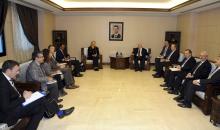 Syrian Foreign Minister Walid al-Muallem (center R) meets Sigrid Kaag (center L), Special Coordinator of the Organisation for the Prohibition of Chemical Weapons-United Nations (OPCW-UN) joint mission on eliminating Syria's chemical weapons