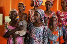 One of the 21 Chibok school girls released by Boko Haram carries her baby during their visit to meet President Muhammadu Buhari In Abuja, Nigeria, October 19, 2016. PHOTO BY REUTERS/Afolabi Sotunde