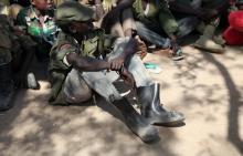 Rebel child soldiers gather in Gumuruk, as they prepare to handover their weapons at a demobilisation ceremony in Jonglei State, eastern South Sudan, January 27, 2015. PHOTO BY REUTERS/Katy Migiro