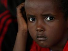 A migrant child rests on the Malta-based NGO Migrant Offshore Aid Station (MOAS) ship Phoenix after being rescued from a wooden boat in the central Mediterranean in international waters off the coast of Sabratha in Libya, April 15, 2017. PHOTO BY REUTERS/Darrin Zammit Lupi