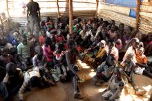 Children sit on the floor inside a classroom in Konyokonyo camp for the internally displaced people in Juba, South Sudan, January 31, 2018. PHOTO BY REUTERS/Samir Bol