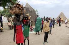 South Sudanese children carry firewood on their heads in the SPLA-IO rebel control area in the Southern part of Unity State Paynjiar County, March 20, 2015. PHOTO BY REUTERS/Denis Dumo