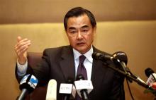 China's Foreign Minister Wang Yi speaks to members of the media during a news conference with his Algerian counterpart Ramtane Lamamra in Algiers