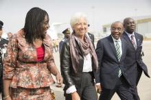 International Monetary Fund Managing (IMF) Director Christine Lagarde (C) is escorted by Nigeria's Finance Minister Kemi Adeosun (L) and Nigeria's Central Bank Governor Godwin Emefiele (2nd R) upon arriving at the Nnamdi Azikiwe International Airport in Abuja, Nigeria, January 4, 2016. PHOTO BY REUTERS/Stephen Jaffe