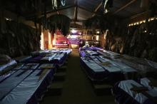 Coffins containing the remains of victims of mass killings during the 1994 genocide are displayed in a Catholic Church in Nyamata, April 9, 2014. PHOTO BY REUTERS/Noor Khamis