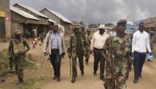 Congolese leaders of the M23 rebels are escorted in Bunagana, in eastern Democratic Republic of Congo