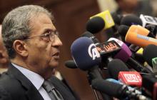 Amr Moussa, chairman of the committee to amend the country's constitution speaks at a news conference at the Shura Council in Cairo
