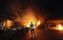 The U.S. Consulate in Benghazi is seen in flames during a protest by an armed group said to have been protesting a film being produced in the United States