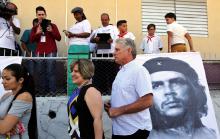 Cuba's First Vice-President Miguel Diaz-Canel and his wife Lis Cuesta stand in line before Diaz-Canel casts his vote during an election of candidates for the national and provincial assemblies, in Santa Clara Cuba, March 11, 2018. PHOTO BY REUTERS/Alejandro Ernesto