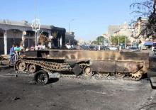 A damaged military vehicle is seen following heavy clashes between rival factions in Abu Salim district in Tripoli, Libya, May 28, 2017. PHOTO BY REUTERS/Hani Amara