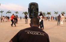 People dance Kizomba as DJ plays on a beach in Luanda, Angola, February 16, 2020. PHOTO BY REUTERS/Lee Bogata 
