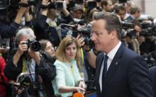 Britain's Prime Minister David Cameron arrives at an European Union leaders summit in Brussels