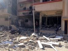 A view of the damaged home of a member of Ansar al-Sharia, after it was destroyed by armed groups loyal to former general Khalifa Haftar, in Benghazi, October 26, 2014. PHOTO BY REUTERS/Stringer