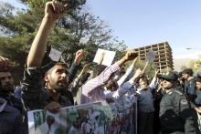 Demonstrators chant slogans during a protest against Saudi Arabia after a crush in which at least 155 Iranians were killed at the haj pilgrimage, in front of Saudi Arabia's embassy in Tehran, September 27, 2015. PHOTO BY REUTERS/Raheb Homavandi