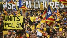 Catalan pro-independence demonstrators gather at Catalunya square during a rally in Barcelona, October 19, 2014. PHOTO BY REUTERS/Albert Gea