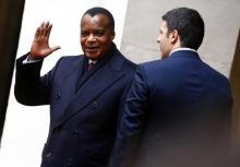 Congo's President Denis Sassou Nguesso waves as he arrives to attend a meeting with Italy's Prime Minister Matteo Renzi at Chigi Palace in Rome, February 26, 2015. PHOTO BY REUTERS/Tony Gentile