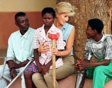 Diana, Princess of Wales, talks to disabled former government soldiers at an orthopaedic centre outside Luanda, Angola, January 14, 1997. PHOTO BY REUTERS/Jose Manuel Ribeiro