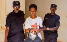 Diane Shima Rwigara, a prominent critic of Rwanda's president Paul Kagame, is escorted by policemen into a courtroom in Kigali, Rwanda, October 6, 2017. PHOTO BY REUTERS/Jean Bizimana