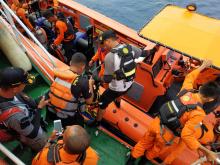 Divers prepare to set out for a search, days after Indonesia's Lion Air flight JT610 crashed into the sea, in this image obtained from social media on October 31, 2018. PHOTO BY REUTERS/Courtesy of BASARNAS/Social Media