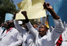 Kenyan student doctors shout slogans as they participate in a strike to demand fulfilment of a 2013 agreement between doctors' union and the government that would raise the medical practitioners pay and improve working conditions in Nairobi, Kenya, January 19, 2017. PHOTO BY REUTERS/Thomas Mukoya