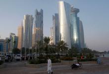 A man walks on the corniche in Doha, Qatar, June 15, 2017. PHOTO BY REUTERS/Naseem Zeitoon