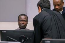 Dominic Ongwen, a former senior rebel commander from the Lord's Resistance Army in Uganda, stands in the courtroom of the International Criminal Court (ICC) during the confirmation of charges in The Hague, the Netherlands, January 21, 2016. PHOTO BY REUTERS/Michael Kooren