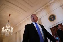 U.S. President Donald Trump reacts as he leaves a Made in America roundtable meeting in the East Room of the White House in Washington, U.S., July 19, 2017. PHOTO BY REUTERS/Carlos Barria