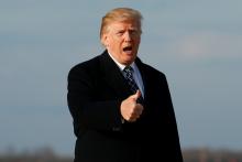 U.S. President Donald Trump gives thumbs-up as he returns from Palm Beach, Florida, at Joint Base Andrews in Maryland, U.S., March 25, 2018. PHOTO BY REUTERS/Joshua Roberts