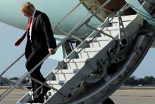 U.S. President Donald Trump arrives at Palm Beach International Airport, Florida, U.S., for the Easter weekend at Mar-a-Lago in Palm Beach, March 29, 2018. PHOTO BY REUTERS/Yuri Gripas