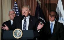 U.S. President Donald Trump speaks prior to signing an executive order on "energy independence," eliminating Obama-era climate change regulations, during an event at the Environmental Protection Agency (EPA) headquarters in Washington, U.S., March 28, 2017. PHOTO BY REUTERS/Carlos Barria