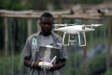 A member of the Ivorian Investiv Group startup, take off a drone at a tomatoes farm in northern Abidjan, Ivory Coast, April 26, 2019. PHOTO BY REUTERS/Luc Gnago