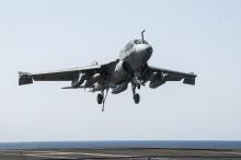 An EA-6B Prowler attached to the Garudas of Electronic Attack Squadron (VAQ) 134 lands aboard the aircraft carrier USS George H.W. Bush (CVN 77) after conducting strike missions against the Islamic State of Iraq and the Levant (ISIL), also known as the Islamic State, targets, in the Gulf