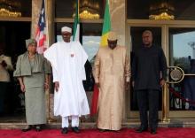 (L-R) Liberia's President Ellen Johnson-Sirleaf, Nigeria's President Muhammadu Buhari, Senegal's President Macky Sall and former Ghanian President John Mahama pose for pictures during the special meeting of Ecowas delegations on Gambia election crisis in Abuja, Nigeria, January 9, 2017. PHOTO BY REUTERS/Afolabi Sotunde