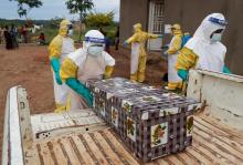 Healthcare workers carry the coffin of a baby believed to have died of Ebola, in Beni, North Kivu Province of Democratic Republic of Congo, December 15, 2018. PHOTO BY REUTERS/Goran Tomasevic