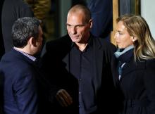 Greek economist Yanis Varoufakis (C) is seen outside the Syriza party headquarters in Athens, late January 25, 2015. PHOTO BY REUTERS/Alkis Konstantinidis