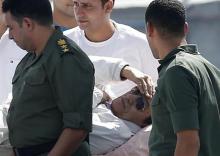 Egypt's former president Hosni Mubarak being transported to a military hospital