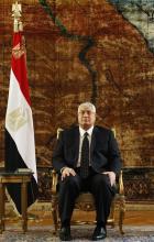 Egypt's interim President Adly Mansour attends a meeting