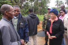 Liberian President Ellen Johnson-Sirleaf speaks to villagers about Ebola virus precautions outside Ganta, Liberia, October 7, 2014. PHOTO BY REUTERS/Daniel Flynn