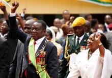 Zimbabwe's new president Emmerson Mnangagwa and his wife Auxillia wave to their suppoters as they leave after the swearing in ceremony in Harare, Zimbabwe, November 24, 2017. PHOTO BY REUTERS/Siphiwe Sibeko