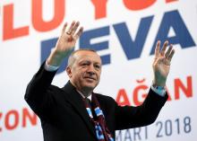 Turkish President Tayyip Erdogan greets his supporters during a meeting of his ruling AK Party in Trabzon, Turkey, March 25, 2018. PHOTO BY REUTERS/Murat Cetinmuhurdar/Presidential Palace