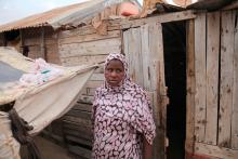 Mbarka Mint Essatim, 30, a slavery survivor, poses for a portrait outside her tent in a slum in Nouakchott, the capital of Mauritania, October 18, 2018. PHOTO BY Thomson Reuters Foundation/Nellie Peyton