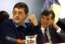 Eugene de Kock, (L) an apartheid-era assassin nicknamed Prime Evil, appears at the Truth And Reconcilation Commission (TRC) amnesty hearing with his lawyer Schalk Hugo in a file photo.