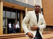 #ThisFlag movement leader Pastor Evan Mawarire, who is facing charges of organising demonstrations and inciting violence, leaves court in Harare, Zimbabwe, February 17, 2017. PHOTO BY REUTERS/Philimon Bulawayo