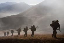 Russian servicemen take part in an exercise to test a new mobile cable lift on a military training ground, about 15 km (9 miles) south of Vladikavkaz, in the Republic of North Ossetia November 23, 2012. PHOTO BY REUTERS/Kazbek Basayev