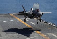 A Marine Corps pilot prepares for a vertical landing of Lockheed Martin F-35B stealth fighter aboard the USS Wasp amphibious assault carrier during their operation in the waters off Japan's southernmost island of Okinawa, March 23, 2018. PHOTO BY REUTERS/Issei Kato