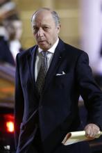 French Minister of Foreign Affairs Laurent Fabius leaves the Elysee Palace after a meeting dedicated to the situation in the Central African Republic, at the end of the Elysee Summit for Peace and Security in Africa, in Paris