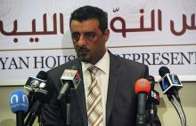 Faraj Hashem, a parliamentary spokesman, speaks during a news conference in Tobruk