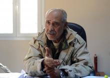 Colonel Farraj al-Barasi, an army commander running a military sector in eastern Benghazi, speaks during an interview with Reuters in Benghazi, January 20, 2015. PHOTO BY REUTERS/Esam Omran Al-Fetori